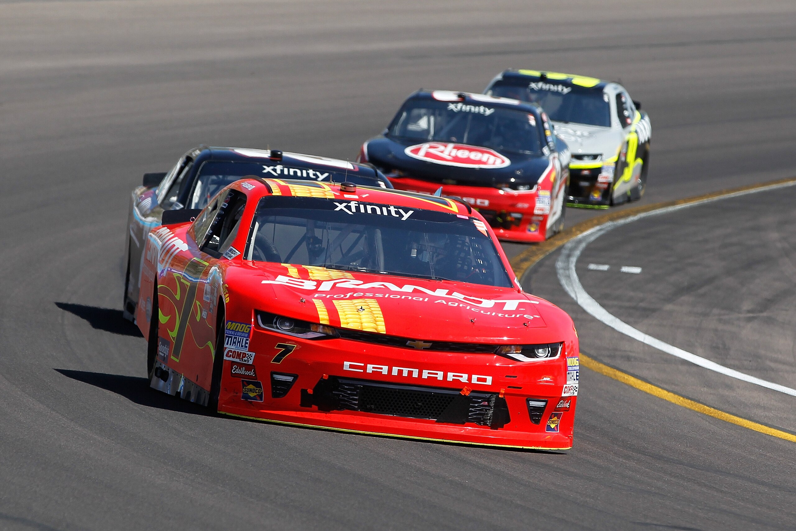 AVONDALE, AZ - MARCH 18:  Justin Allgaier, driver of the #7 BRANDT Chevrolet, leads a pack of cars during the NASCAR XFINITY Series DC Solar 200 at Phoenix International Raceway on March 18, 2017 in Avondale, Arizona.  (Photo by Brian Lawdermilk/Getty Images)