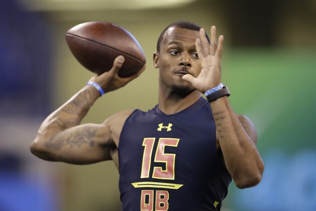 Clemson quarterback Deshaun Watson runs a drill at the NFL football scouting combine Saturday, March 4, 2017, in Indianapolis. (AP Photo/David J. Phillip)