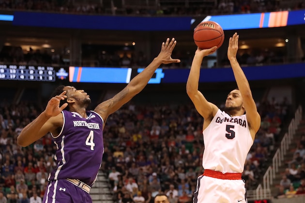 SALT LAKE CITY, UT - MARCH 18: Nigel Williams-Goss #5 of the Gonzaga Bulldogs attempts a shot defended by Vic Law #4 of the Northwestern Wildcats during the second round of the 2017 NCAA Men's Basketball Tournament at Vivint Smart Home Arena on March 18, 2017 in Salt Lake City, Utah.  (Photo by Christian Petersen/Getty Images)