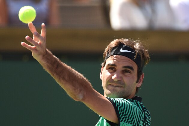 INDIAN WELLS, CA - MARCH 18: Roger Federer of Switzerland serves against Jack Sock of the United States during his semi final match during day thirteen of the BNP Paribas Open at Indian Wells Tennis Garden on March 18, 2017 in Indian Wells, California. (Photo by Kevork Djansezian/Getty Images)