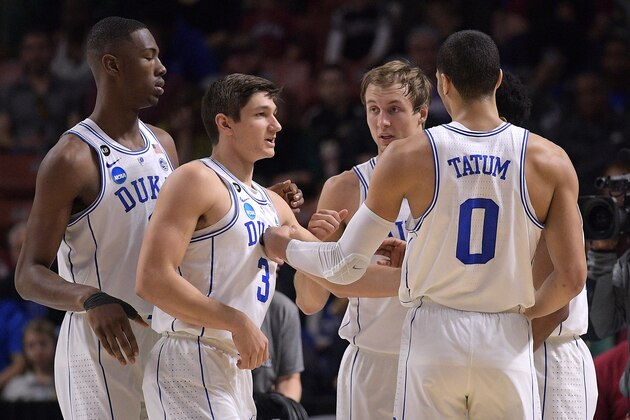 GREENVILLE, SC - MARCH 17: Harry Giles #1, Grayson Allen #3, Luke Kennard #5 and Jayson Tatum #0 of the Duke Blue Devils huddle during their game against the Troy Trojans during the first round of the 2017 NCAA Men's Basketball Tournament at Bon Secours Wellness Arena on March 17, 2017 in Greenville, South Carolina. (Photo by Lance King/Getty Images)