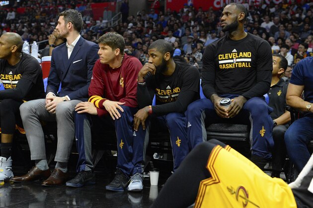 LOS ANGELES, CA - MARCH 18:  (left to right) Kevin Love #0, Kyle Korver #26, Kyrie Irving #2 and Lebron James #23 of the Cleveland Cavaliers sitting out the game against the Los Angeles Clippers on March 18, 2017 at STAPLES Center in Los Angeles, California. NOTE TO USER: User expressly acknowledges and agrees that, by downloading and or using this photograph, User is consenting to the terms and conditions of the Getty Images License Agreement.  (Photo by Robert Laberge/Getty Images)