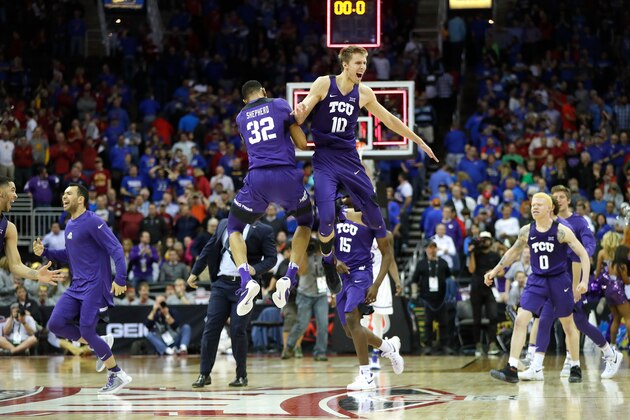 KANSAS CITY, MO - MARCH 09:  Vladimir Brodziansky #10 and Karviar Shepherd #32 of the TCU Horned Frogs celebrate as the Horned Frogs defeat the Kansas Jayhawks 85-82 to win the quarterfinal game of the Big 12 Basketball Tournament at the Sprint Center on March 9, 2017 in Kansas City, Missouri.  (Photo by Jamie Squire/Getty Images)