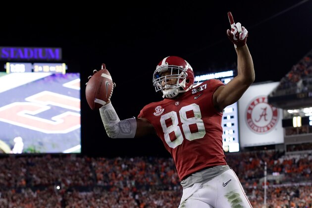 TAMPA, FL - JANUARY 09:  Tight end O.J. Howard #88 of the Alabama Crimson Tide celebrates after scoring a 68-yard touchdown during the third quarter against the Clemson Tigers in the 2017 College Football Playoff National Championship Game at Raymond James Stadium on January 9, 2017 in Tampa, Florida.  (Photo by Jamie Squire/Getty Images)