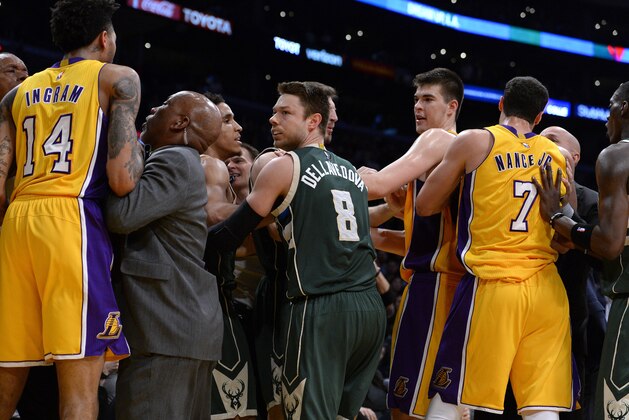 LOS ANGELES, CA - MARCH 17:  Matthew Dellavedova #8 of the Milwaukee Bucks is part of a scuffle that also involves Brandon Ingram #14, Ivica Zubac #40 and Larry Nance Jr. #7 of the Los Angeles Lakers on March 17, 2017 at STAPLES Center in Los Angeles, California. NOTE TO USER: User expressly acknowledges and agrees that, by downloading and or using this photograph, User is consenting to the terms and conditions of the Getty Images License Agreement.  (Photo by Robert Laberge/Getty Images)