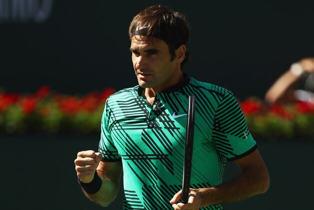 INDIAN WELLS, CA - MARCH 19:  Roger Federer of Switzerland celebrates winning the first set against Stanislas Wawrinka of Switzerland in the mens final during day fourteen of the BNP Paribas Open at Indian Wells Tennis Garden on March 19, 2017 in Indian Wells, California.  (Photo by Clive Brunskill/Getty Images)