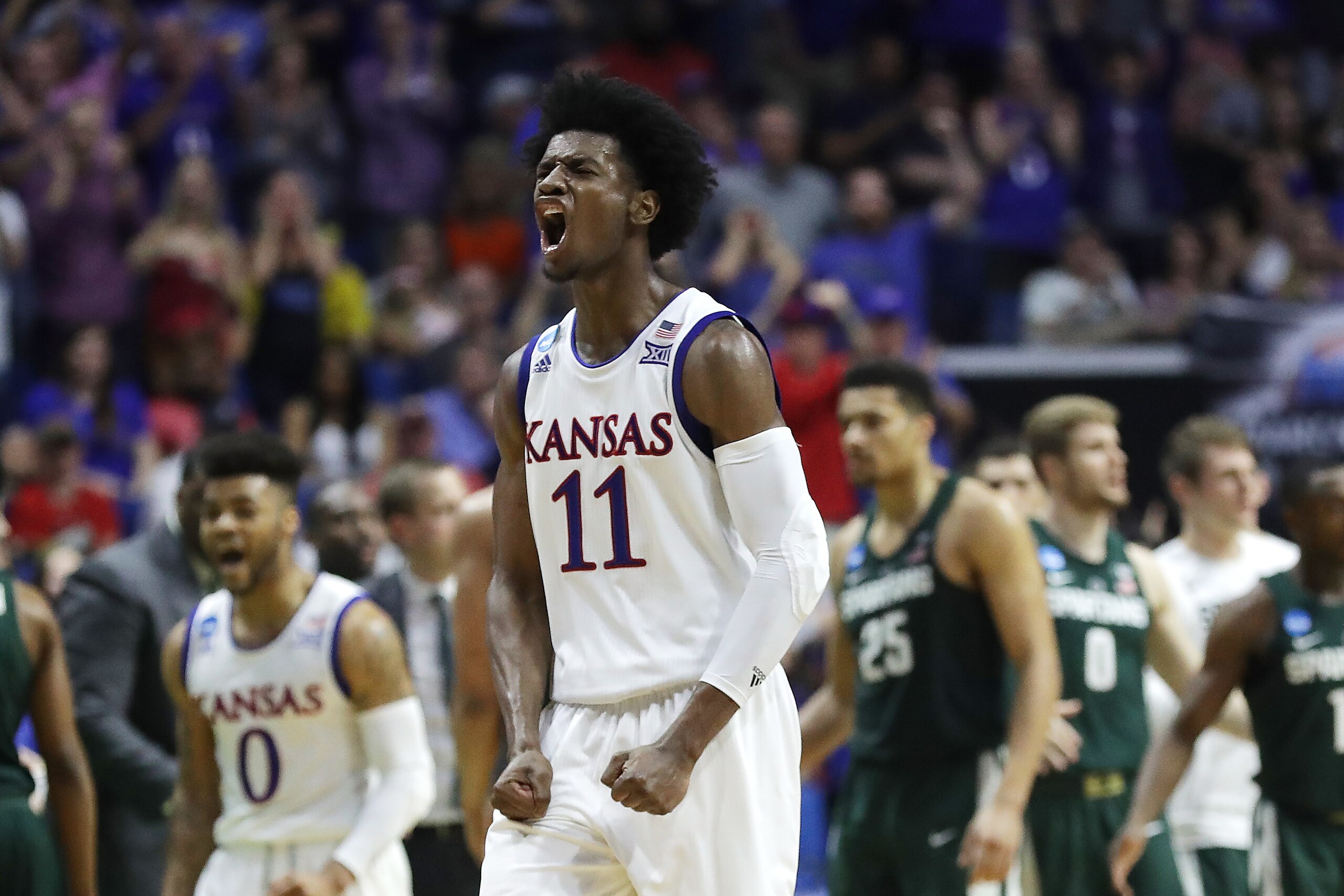 TULSA, OK - MARCH 19:  Josh Jackson #11 of the Kansas Jayhawks reacts against the Michigan State Spartans during the second round of the 2017 NCAA Men's Basketball Tournament at BOK Center on March 19, 2017 in Tulsa, Oklahoma.  (Photo by Ronald Martinez/Getty Images)
