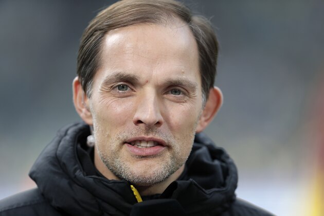 Dortmund's head coach Thomas Tuchel speaks during a TV interview prior to the German Bundesliga soccer match between Hertha BSC Berlin and Borussia Dortmund in Berlin, Germany, Saturday, March 11, 2017. Berlin defeated Dortmund by 2-1. (AP Photo/Michael Sohn)