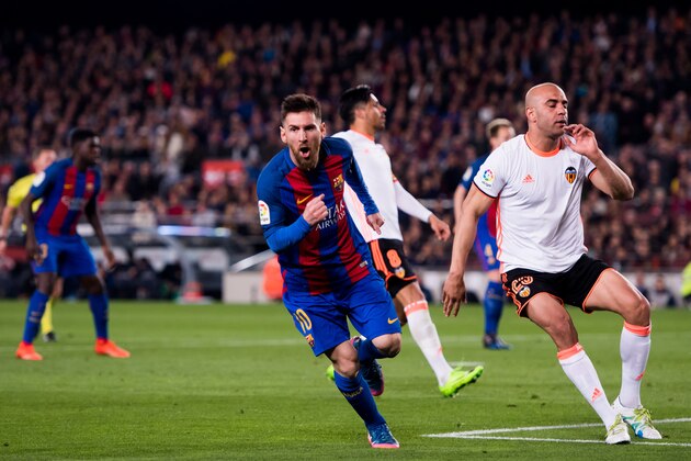 BARCELONA, SPAIN - MARCH 19:  Lionel Messi of FC Barcelona celebrates after scoring his team's third goal during the La Liga match between FC Barcelona and Valencia CF at Camp Nou stadium on March 19, 2017 in Barcelona, Spain.  (Photo by Alex Caparros/Getty Images)