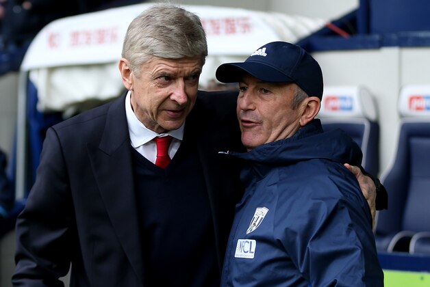 WEST BROMWICH, ENGLAND - MARCH 18:  Arsene Wenger, Manager of Arsenal (L) and Tony Pulis, Manager of West Bromwich Albion (R) embrace prior to the Premier League match between West Bromwich Albion and Arsenal at The Hawthorns on March 18, 2017 in West Bromwich, England.  (Photo by Alex Morton/Getty Images)