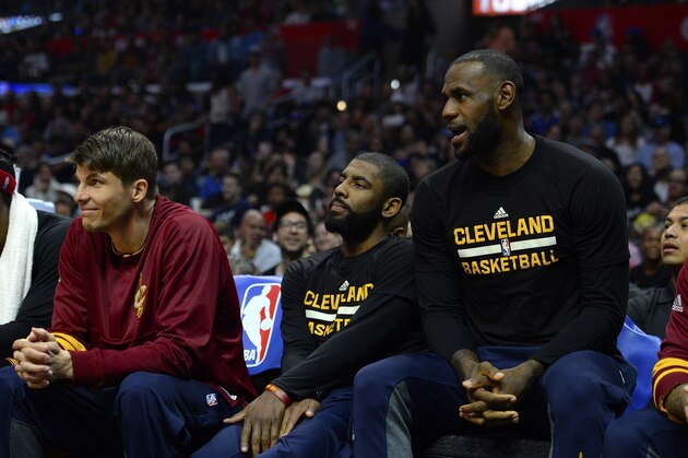 LOS ANGELES, CA - MARCH 18:  (left to right) Kyle Korver #26, Kyrie Irving #2 and Lebron James #23 of the Cleveland Cavaliers sitting out the game against the Los Angeles Clippers on March 18, 2017 at STAPLES Center in Los Angeles, California. NOTE TO USER: User expressly acknowledges and agrees that, by downloading and or using this photograph, User is consenting to the terms and conditions of the Getty Images License Agreement.  (Photo by Robert Laberge/Getty Images)