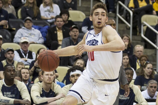 PITTSBURGH, PA - MARCH 10: T.J. Cline #10 of the Richmond Spiders drives to the basket against the George Washington Colonials in the Quarterfinals of the men's Atlantic 10 tournament at the PPG Paints Arena on March 10, 2017 in Pittsburgh, Pennsylvania. The Spiders defeated the Colonials 70-67. (Photo by Mitchell Leff/Getty Images)