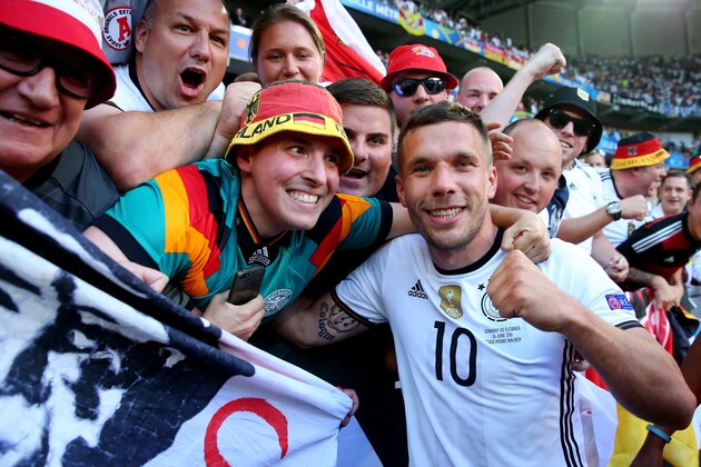 LILLE, FRANCE - JUNE 26:  Lukas Podolski of Germany celebrates his team's 3-0 win with the supporters after the UEFA EURO 2016 round of 16 match between Germany and Slovakia at Stade Pierre-Mauroy on June 26, 2016 in Lille, France.  (Photo by Alexander Hassenstein/Getty Images)