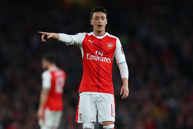 LONDON, ENGLAND - MARCH 11: Mesut Ozil of Arsenal during The Emirates FA Cup Quarter-Final match between Arsenal and Lincoln City at Emirates Stadium on March 11, 2017 in London, England. (Photo by Catherine Ivill - AMA/Getty Images) LONDON, ENGLAND - MARCH 11: Mesut Ozil of Arsenal during The Emirates FA Cup Quarter-Final match between Arsenal and Lincoln City at Emirates Stadium on March 11, 2017 in London, England. (Photo by Catherine Ivill - AMA/Getty Images)