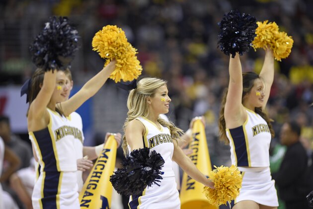 Michigan cheerleaders perform during the first half of the Big Ten NCAA college basketball championship game against Wisconsin, Sunday, March 12, 2017, in Washington. (AP Photo/Nick Wass)