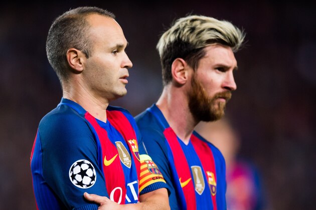 BARCELONA, SPAIN - OCTOBER 19: Andres Iniesta (L) and Lionel Messi of FC Barcelona look on during the UEFA Champions League group C match between FC Barcelona and Manchester City FC at Camp Nou on October 19, 2016 in Barcelona, Spain. (Photo by Alex Caparros/Getty Images)