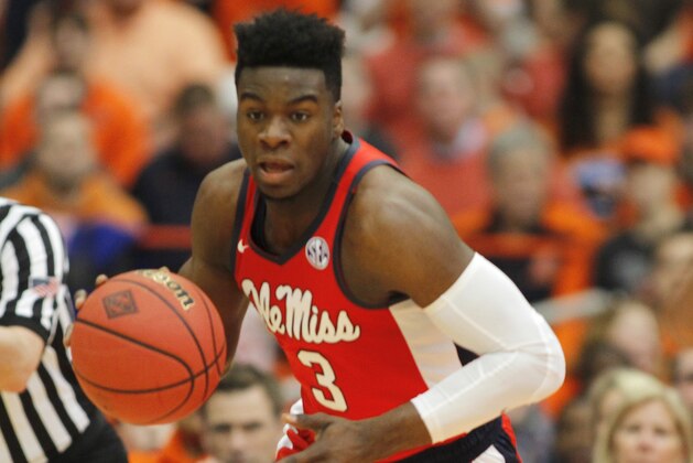 Mississippi's Terence Davis dribbles down court in the second half of an NCAA college basketball NIT game against Syracuse in Syracuse, N.Y., Saturday, March 18, 2017. Mississippi won 85-80. (AP Photo/Nick Lisi)