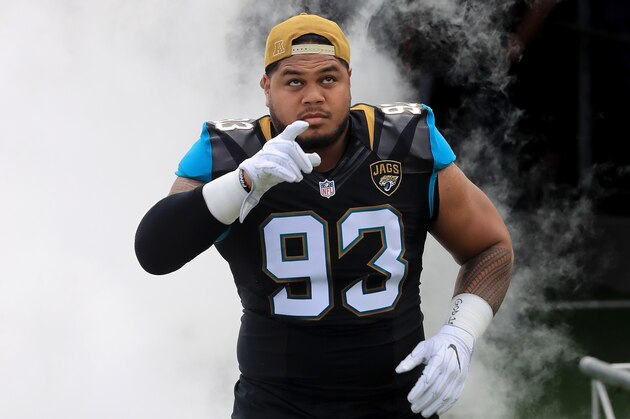 JACKSONVILLE, FL - DECEMBER 04:   Tyson Alualu #93 of the Jacksonville Jaguars warms up before action against the Denver Broncos at EverBank Field on December 4, 2016 in Jacksonville, Florida.  (Photo by Sam Greenwood/Getty Images)