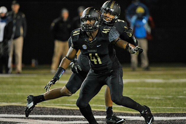 NASHVILLE, TN - NOVEMBER 19:  Zach Cunningham #41 of the Vanderbilt Commodores plays against the Ole Miss Rebels at Vanderbilt Stadium on November 19, 2016 in Nashville, Tennessee.  (Photo by Frederick Breedon/Getty Images)