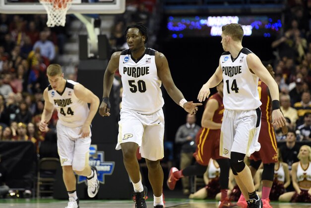 Mar 18, 2017; Milwaukee, WI, USA; Purdue Boilermakers forward Caleb Swanigan (50) and guard Ryan Cline (14) celebrate during the first half of the game against the Iowa State Cyclones in the second round of the 2017 NCAA Tournament at BMO Harris Bradley Center. Mandatory Credit: Benny Sieu-USA TODAY Sports