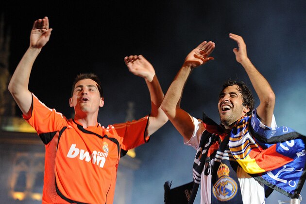 Real Madrid football club's Raul (R) and goalkeeper Iker Casillas celebrates their 31st league title win in Madrid on May 4, 2008. Thousands of Real Madrid fans converged on the famous Cibeles fountain in the Spanish capital on May 4 to celebrate their team's 31st league title after a 2-1 win over Osasuna. AFP PHOTO / PIERRE-PHILIPPE MARCOU (Photo credit should read PIERRE-PHILIPPE MARCOU/AFP/Getty Images)