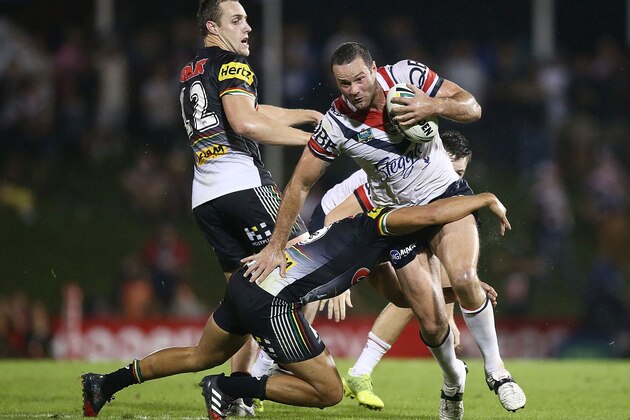 SYDNEY, AUSTRALIA - MARCH 18:  Boyd Cordner of the Roosters is tackled during the round three NRL match between the Penrith Panthers and the Sydney Roosters at Pepper Stadium on March 18, 2017 in Sydney, Australia.  (Photo by Mark Metcalfe/Getty Images)