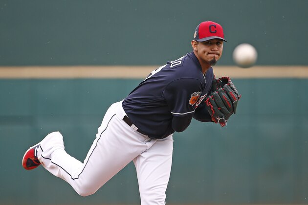 Cleveland Indians starting pitcher Carlos Carrasco warms up during the second inning of a spring training baseball game against the Texas Rangers Monday, Feb. 27, 2017, in Goodyear, Ariz. The Indians defeated the Rangers 3-2. (AP Photo/Ross D. Franklin)