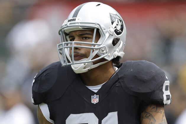 Oakland Raiders tight end Mychal Rivera (81) warms up before an NFL football game against the Cincinnati Bengals in Oakland, Calif., Sunday, Sept. 13, 2015. (AP Photo/Ben Margot)