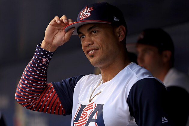 MIAMI, FL - MARCH 10:  Giancarlo Stanton #27 of the United States looks on during a Pool C game of the 2017 World Baseball Classic against Comubia at Miami Marlins Stadium on March 10, 2017 in Miami, Florida.  (Photo by Mike Ehrmann/Getty Images)