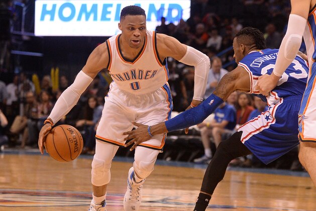Mar 22, 2017; Oklahoma City, OK, USA; Oklahoma City Thunder guard Russell Westbrook (0) drives to the basket in front of Philadelphia 76ers forward Robert Covington (33) during the third quarter at Chesapeake Energy Arena. Mandatory Credit: Mark D. Smith-USA TODAY Sports