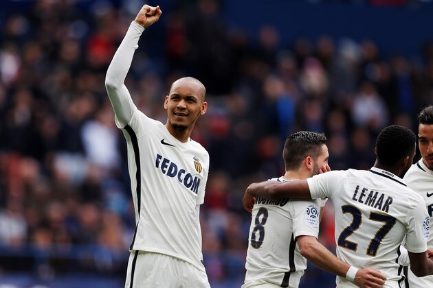 Monaco's Brazilian defender Fabinho (L) celebrates after scoring a penalty kick during the French L1 football match between Caen (SMC) and Monaco (AS), on March 19, 2017 at the Michel d'Ornano stadium, in Caen, northwestern France. / AFP PHOTO / CHARLY TRIBALLEAU        (Photo credit should read CHARLY TRIBALLEAU/AFP/Getty Images)