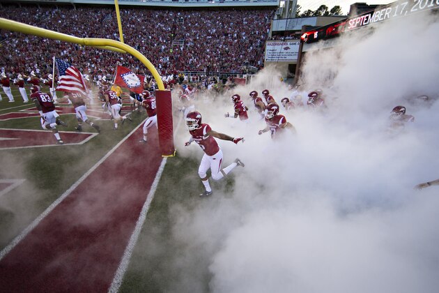 FAYETTEVILLE, AR - SEPTEMBER 17:  Arkansas Razorbacks run onto the field before a game against the Texas State Bobcats at Razorback Stadium on September 17, 2016 in Fayetteville, Arkansas.  The Razorbacks defeated the Bobcats 42-3.  (Photo by Wesley Hitt/Getty Images) *** Local Caption ***