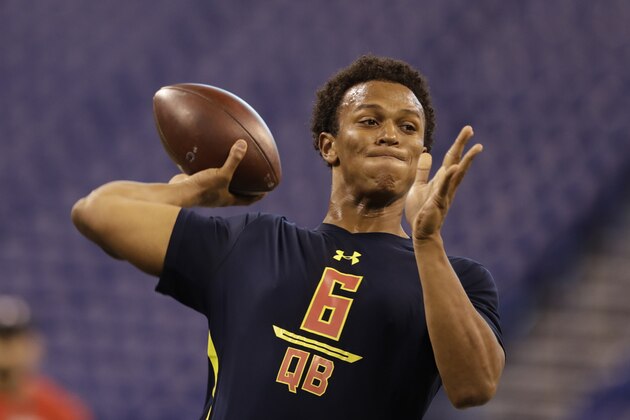 Notre Dame quarterback Deshone Kizer runs a drill at the NFL football scouting combine Saturday, March 4, 2017, in Indianapolis. (AP Photo/David J. Phillip)