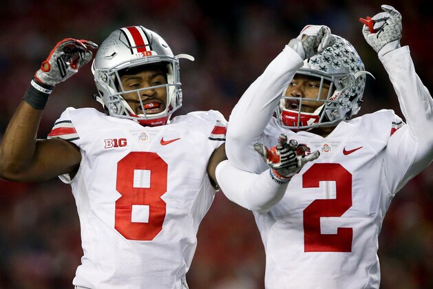 MADISON, WI - OCTOBER 15:  Gareon Conley #8 and Marshon Lattimore #2 of the Ohio State Buckeyes celebrate after Conley made an interception in the third quarter against the Wisconsin Badgers at Camp Randall Stadium on October 15, 2016 in Madison, Wisconsin. (Photo by Dylan Buell/Getty Images)