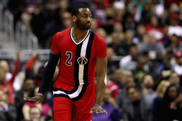 WASHINGTON, DC - MARCH 22: John Wall #2 of the Washington Wizards celebrates after making a shot in the seocnd half against the Atlanta Hawks at Verizon Center on March 22, 2017 in Washington, DC.  NOTE TO USER: User expressly acknowledges and agrees that, by downloading and or using this photograph, User is consenting to the terms and conditions of the Getty Images License Agreement.  (Photo by Rob Carr/Getty Images)