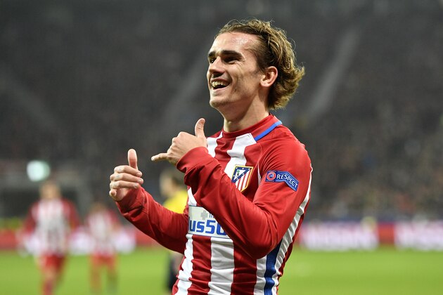 Atletico's Antoine Griezmann celebrates after scoring his side's second goal during the Champions League round of 16 first leg soccer match between Bayer Leverkusen and Atletico Madrid in Leverkusen, Germany, Tuesday, Feb. 21, 2017. (AP Photo/Martin Meissner)