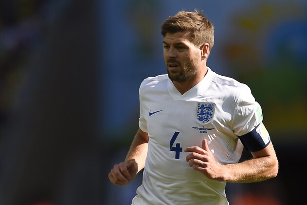 England's midfielder and captain Steven Gerrard runs on the pitch during the Group D football match between Costa Rica and England at The Mineirao Stadium in Belo Horizonte on June 24, 2014,during the 2014 FIFA World Cup . AFP PHOTO / FABRICE COFFRINI        (Photo credit should read FABRICE COFFRINI/AFP/Getty Images)