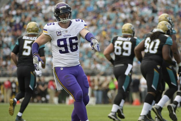 Minnesota Vikings defensive end Brian Robison (96) celebrates after sacking Jacksonville Jaguars quarterback Blake Bortles (5) during the first half of an NFL football game, Sunday, Dec. 11, 2016, in Jacksonville, Fla. (AP Photo/Phelan M. Ebenhack)