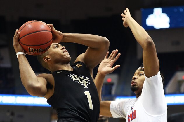 HARTFORD, CT - MARCH 11: B.J. Taylor #1 of the UCF Knights takes a shot against Ben Moore #0 of the Southern Methodist Mustangs during the second half of the semifinal round of the AAC Basketball Tournament at the XL Center on March 11, 2017 in Hartford, Connecticut. (Photo by Maddie Meyer/Getty Images)