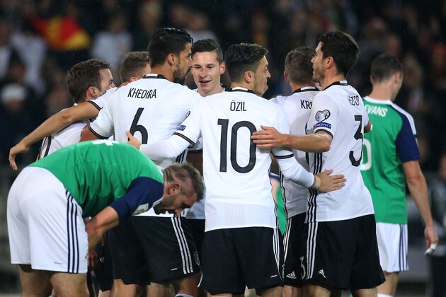 HANOVER, GERMANY - OCTOBER 11: Julian Draxler of Germany celebrates his goal with teammates during the FIFA 2018 World Cup Qualifier between Germany and Northern Ireland at HDI-Arena on October 11, 2016 in Hanover, Lower Saxony. (Photo by Jean Catuffe/Getty Images)