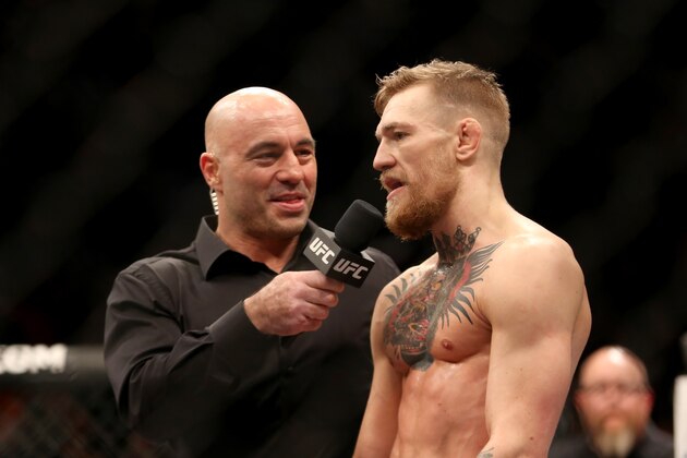 Conor McGregor, of Ireland, is interviewed by Joe Rogan after defeating Denis Siver at UFC Fight Night, Sunday, Jan. 18, 2015 in Boston.  McGregor won via 2nd round TKO. (AP Photo/Gregory Payan)
