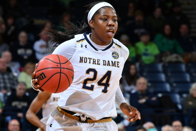 Jan 29, 2017; South Bend, IN, USA; Notre Dame Fighting Irish guard Arike Ogunbowale (24) dribbles the ball in the first quarter against the Virginia Cavaliers at the Purcell Pavilion. Mandatory Credit: Matt Cashore-USA TODAY Sports
