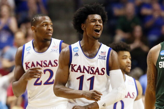FILE - In this Sunday, March 19, 2017, file photo, Kansas guard Josh Jackson (11) celebrates a basket in the second half of a second-round game against Michigan State in the NCAA college basketball tournament in Tulsa, Okla. The drips and dribbles of unsavory news that have followed Kansas all season seems to have stopped, at least for the moment. But what hasn't stopped is the opinions that are getting thrown all over town about the Jayhawks, and more specifically, star freshman Josh Jackson. (AP Photo/Sue Ogrocki, File)