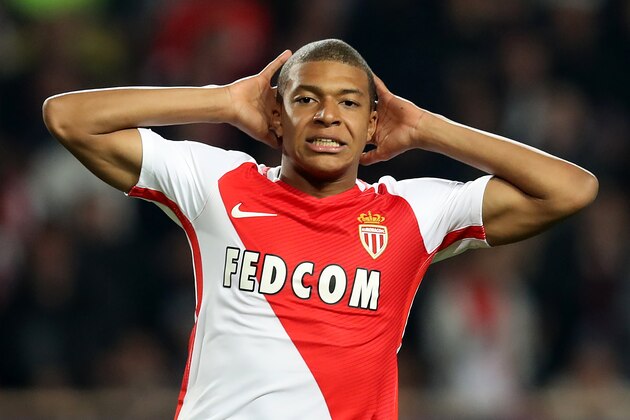Monaco's French forward Kylian Mbappe Lottin reacts after missing a goal opportunity during the UEFA Champions League round of 16 football match between Monaco and Manchester City at the Stade Louis II in Monaco on March 15, 2017. / AFP PHOTO / Valery HACHE (Photo credit should read VALERY HACHE/AFP/Getty Images) Monaco's French forward Kylian Mbappe Lottin reacts after missing a goal opportunity during the UEFA Champions League round of 16 football match between Monaco and Manchester City at the Stade Louis II in Monaco on March 15, 2017. / AFP PHOTO / Valery HACHE (Photo credit should read VALERY HACHE/AFP/Getty Images)