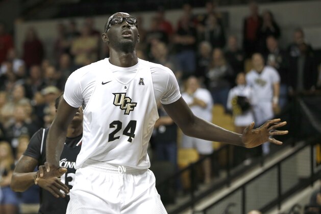 Central Florida center Tacko Fall (24) waits for a pass during the first half of an NCAA college basketball game against Cincinnati in Orlando, Fla., on Sunday, Feb. 26, 2017. (AP Photo/Reinhold Matay)