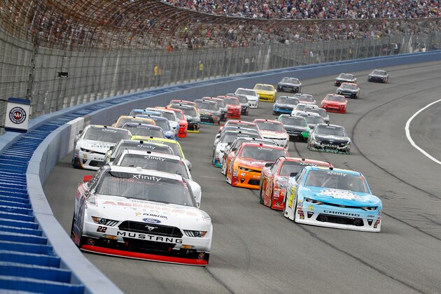 FONTANA, CA - MARCH 25:  Joey Logano, driver of the #22 America's Tire/Discount Tire Ford, leads the field to start the NASCAR XFINITY Series Service King 300 at Auto Club Speedway on March 25, 2017 in Fontana, California.  (Photo by Brian Lawdermilk/Getty Images)