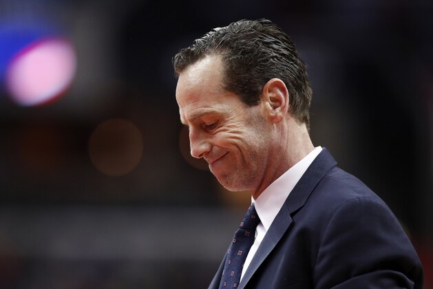 Brooklyn Nets head coach Kenny Atkinson reacts during a timeout the first half of an NBA basketball game against the Washington Wizards, Friday, March 24, 2017, in Washington. (AP Photo/Alex Brandon)
