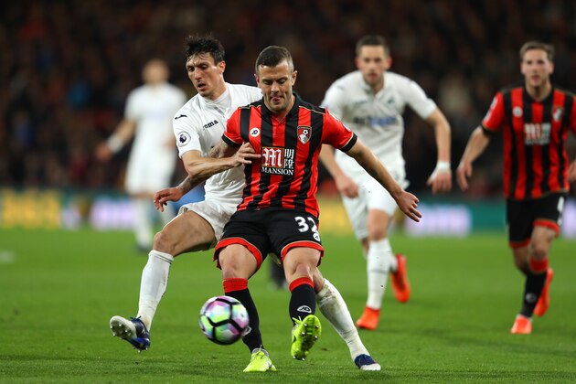 BOURNEMOUTH, ENGLAND - MARCH 18: Jack Cork of Swansea City (L) and Jack Wilshere of AFC Bournemouth (R) battle for possession during the Premier League match between AFC Bournemouth and Swansea City at Vitality Stadium on March 18, 2017 in Bournemouth, England.  (Photo by Warren Little/Getty Images)