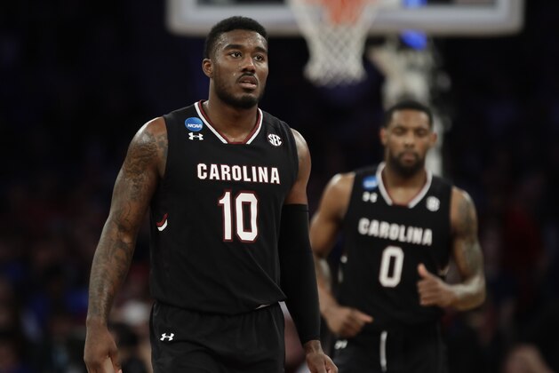 South Carolina guard Duane Notice (10) and South Carolina guard Sindarius Thornwell (0) take up defensive positions against Baylor in the second half of an East Regional semifinal game of the NCAA men's college basketball tournament, Friday, March 24, 2017, in New York. (AP Photo/Frank Franklin II)