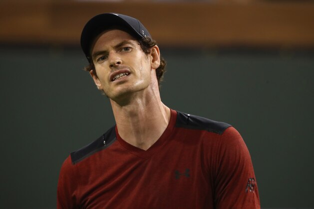 INDIAN WELLS, CA - MARCH 11:  Andy Murray of Great Britain shows his frustration during his straight sets defeat by Vasek Pospisil of Canada  in their second round match during day six of the BNP Paribas Open at Indian Wells Tennis Garden on March 11, 2017 in Indian Wells, California.  (Photo by Clive Brunskill/Getty Images)
